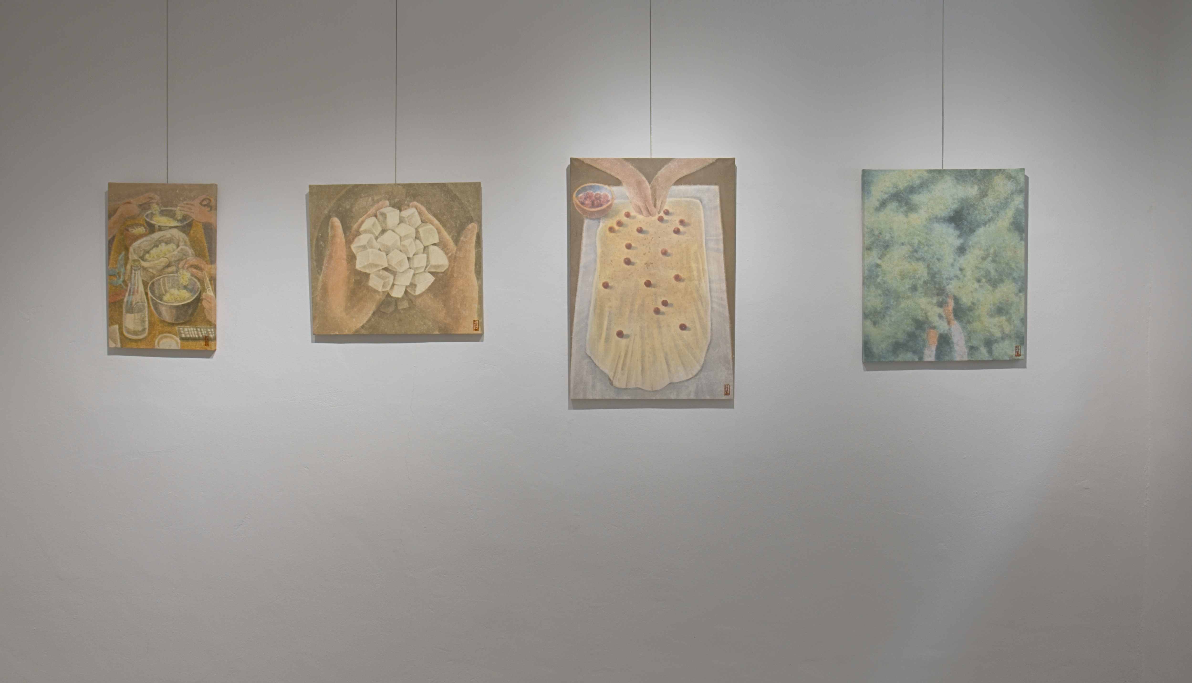 A Meal for Two installation view with paintings on a gallery wall